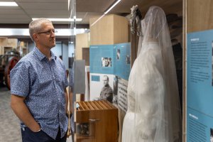 Man looking at museum display