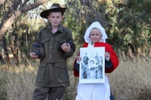 Children dressed a a soldier and a nurse